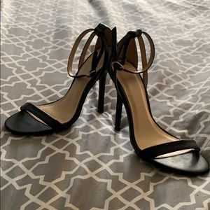 Strappy black heels